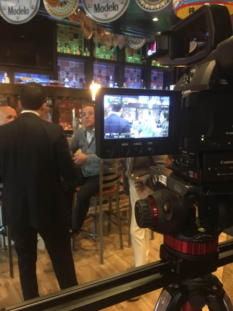 TC Productions crew filming a corporate interview for marketing and sales content